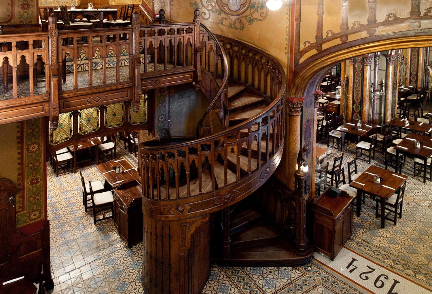 The historic interior of Caru’ cu Bere, Bucharest